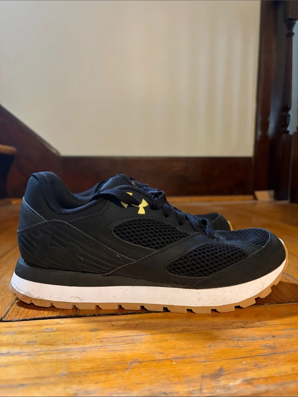 Under Armour Black Athletic Shoes with Gold Logo Accents